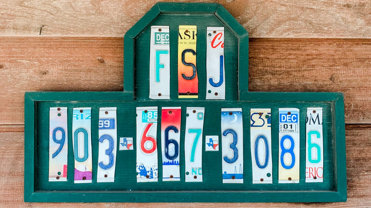 License plate display spelling FSJ above 903-667-3086.