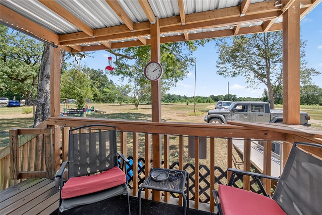 Covered front porch at 350 County Road 3102
