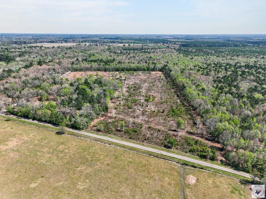Aerial view of the property and road at County Road 4223